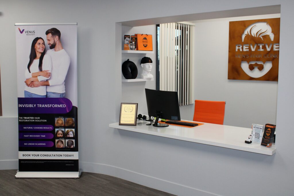 Front desk consultation window at Revive Mens Hair Clinic