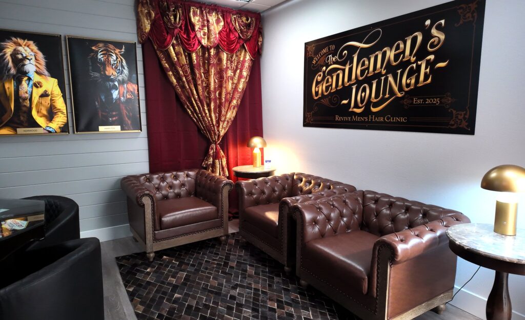 Welcome to the Gentlemens Lounge sign and seating at Revive